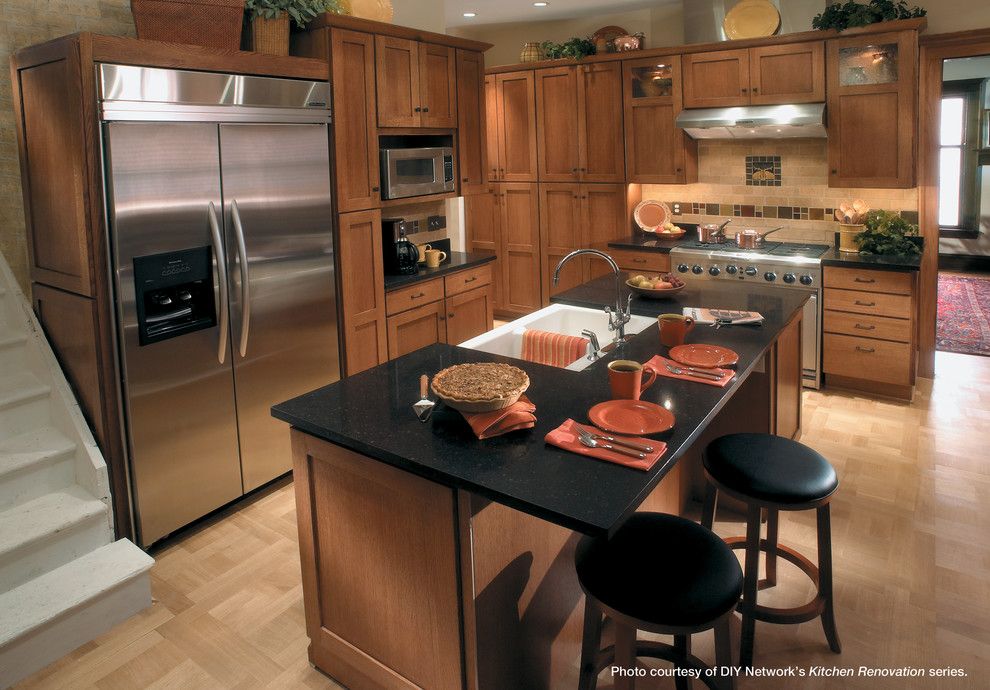 Starmark Cabinets for a Traditional Kitchen with a Cabinets and Starmark Cabinetry Kitchen in Craftsman Style by Starmark Cabinetry