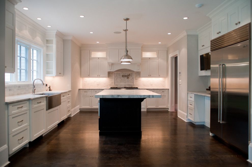 Statuary Marble for a Contemporary Kitchen with a White Kitchen Cabinets and Tenafly Nj Custom Home by Michelle Winick Design