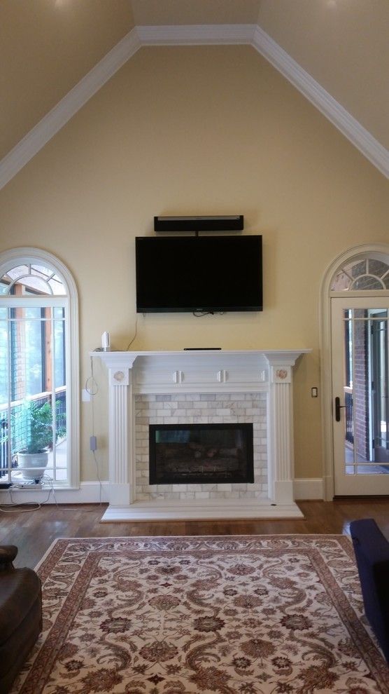 Stoll Fireplace for a Modern Family Room with a Tile Surround and White Subway Tile Fireplace Make Over by Atlanta Fireplace Specialists