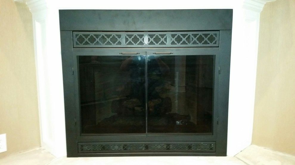 Stoll Fireplace for a Traditional Living Room with a Wood Mantel and After by Kjb Fireplaces