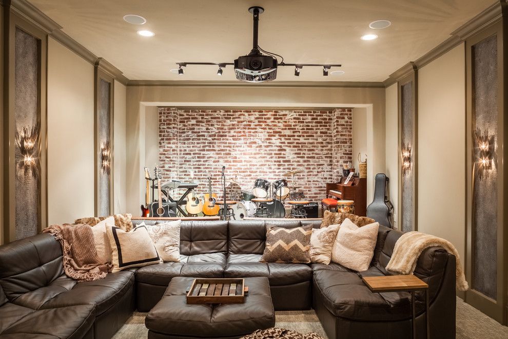 Stony Brook Theater for a Rustic Family Room with a Brown Leather Couch and Kalebs Home by Cindy Aplanalp Yates & Chairma Design Group