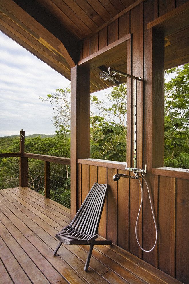 Stowers Furniture for a Rustic Patio with a Handrail and Belize Residence: Outdoor Shower by Robert Granoff