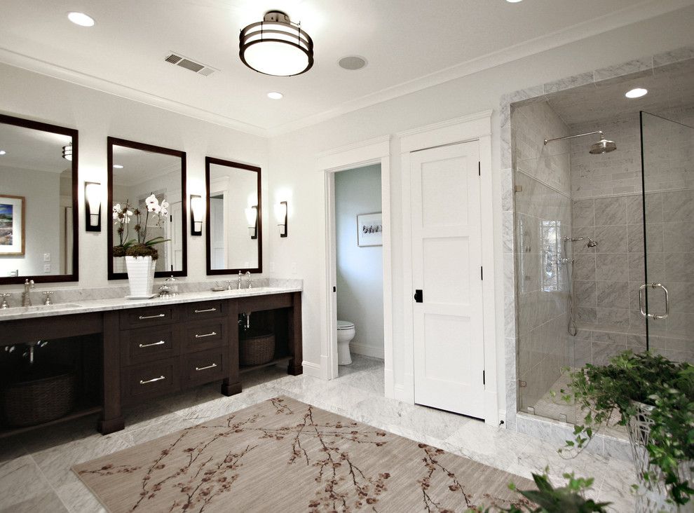 Stowers Furniture for a Traditional Bathroom with a Sconce and Arts & Crafts Bathroom by Dresser Homes