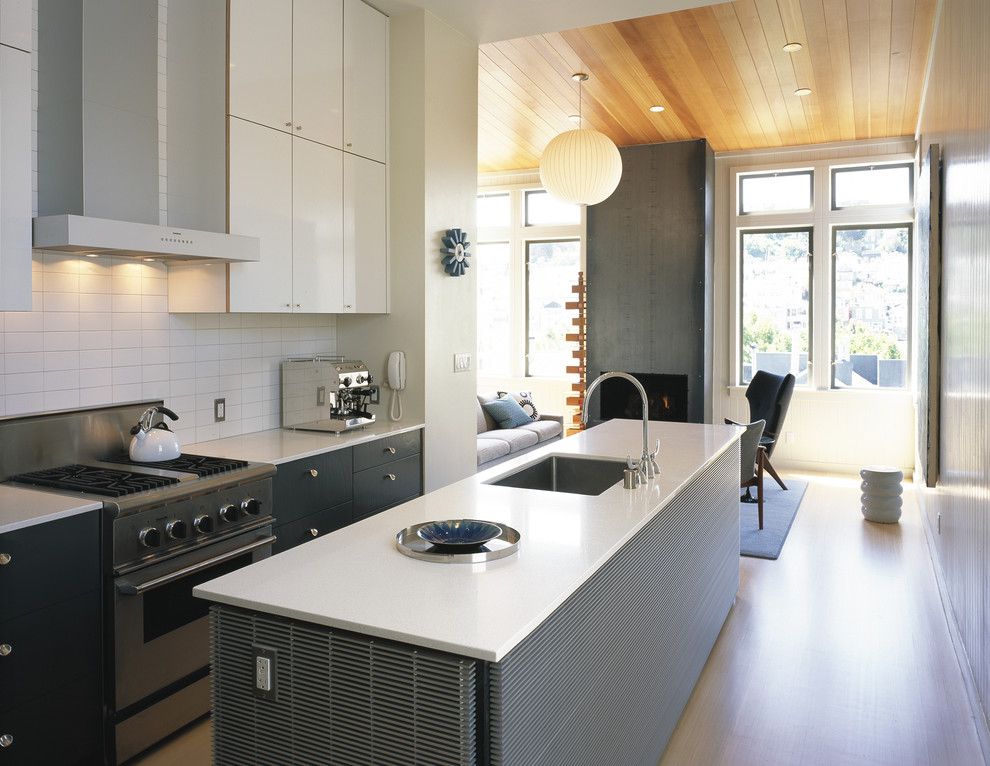 Subway Tile Patterns for a Modern Kitchen with a Wood Flooring and Nordquist by John Lum Architecture, Inc. Aia