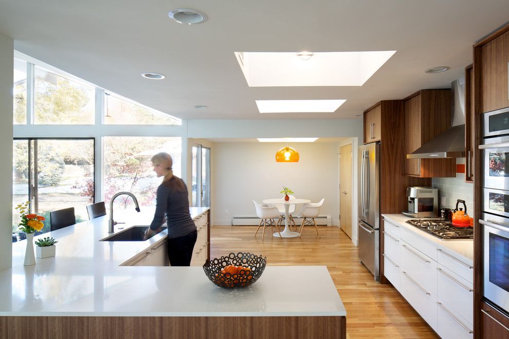 Sugatsune for a Midcentury Kitchen with a White Countertop and Hornstein Residence by Design Platform