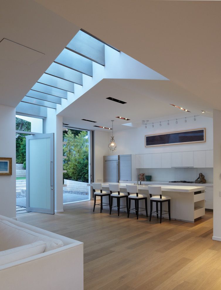 Sugatsune for a Modern Kitchen with a White Kitchen Island and Griffin Enright Architects: Santa Monica Canyon Residence by Griffin Enright Architects