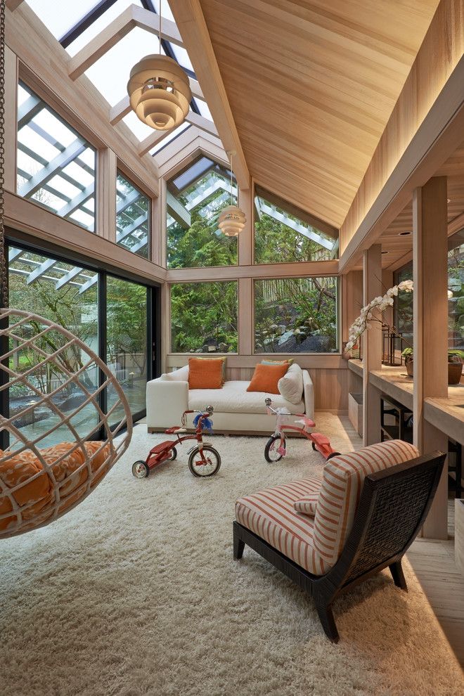 Sunroom Decorating Ideas for a Contemporary Sunroom with a Wood Ceiling and Raleigh Hills Sunroom Addition by Richard Brown Architect Aia