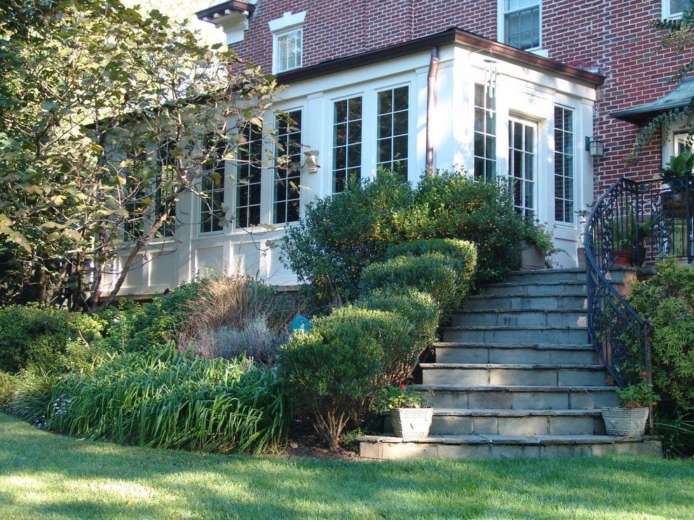 Sunroom Decorating Ideas for a Traditional Exterior with a Wall Lighting and Druid Hills Sunroom by Soorikian Architecture