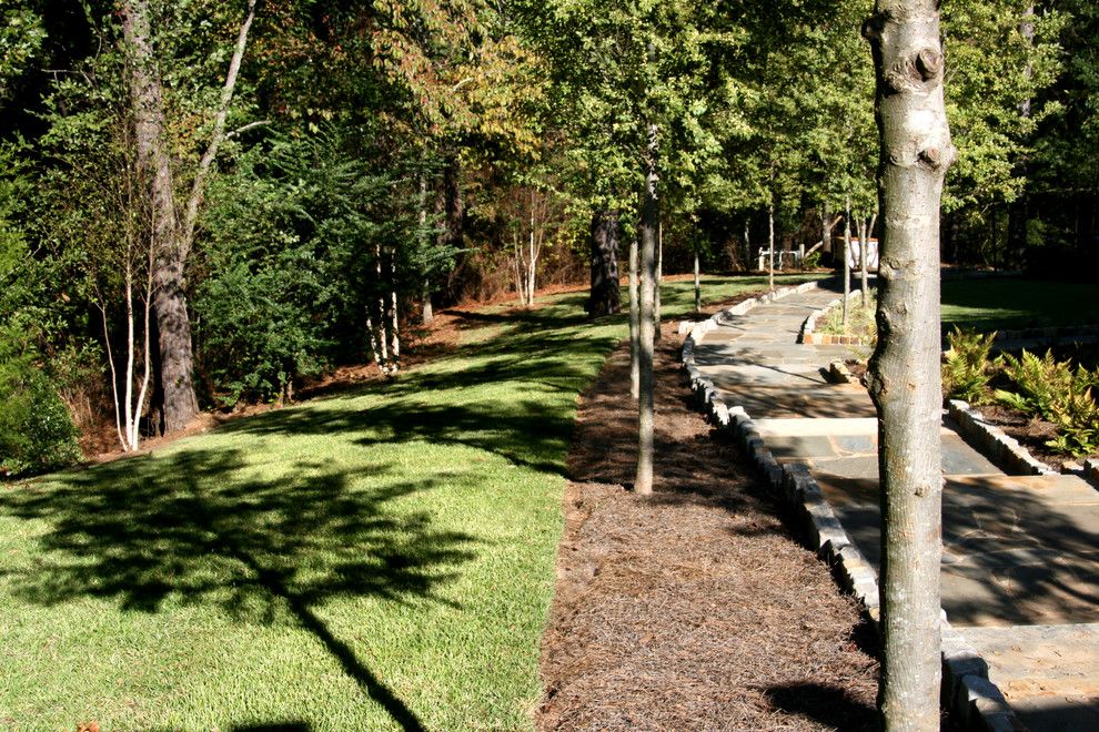 Super Sod for a Farmhouse Landscape with a Stone Path and Zenith Zoysia by Super Sod