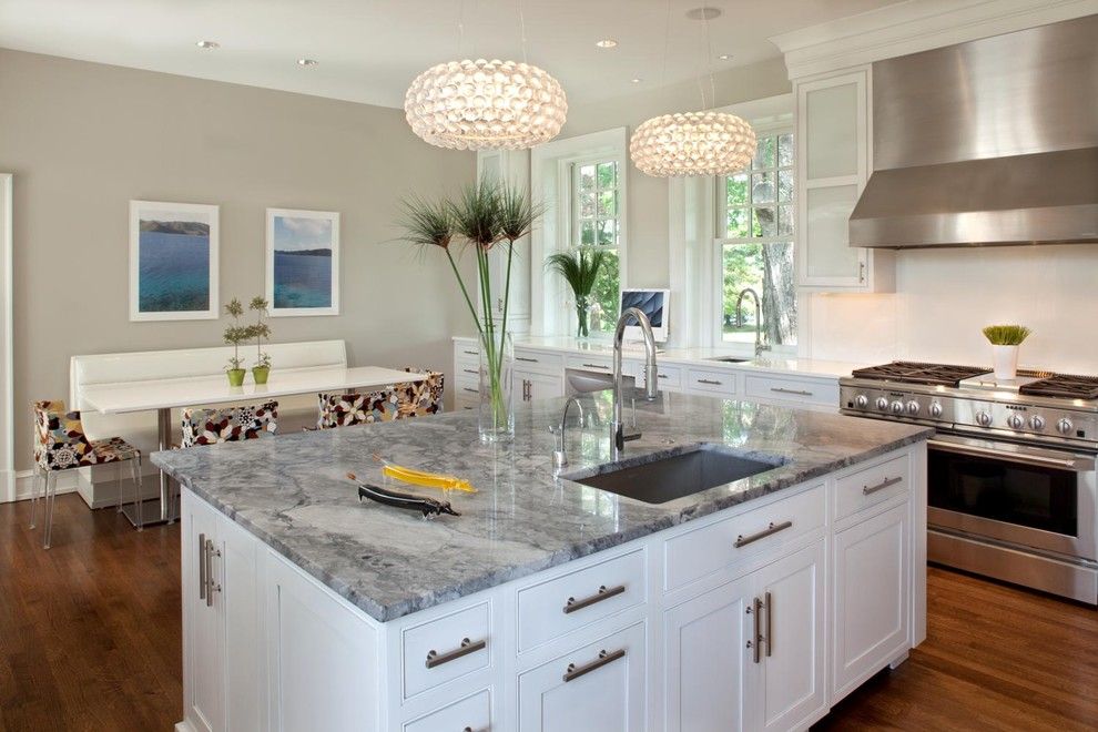 Super White Quartzite for a Contemporary Kitchen with a White Kitchen and Contemporary White by Kitchens by Design