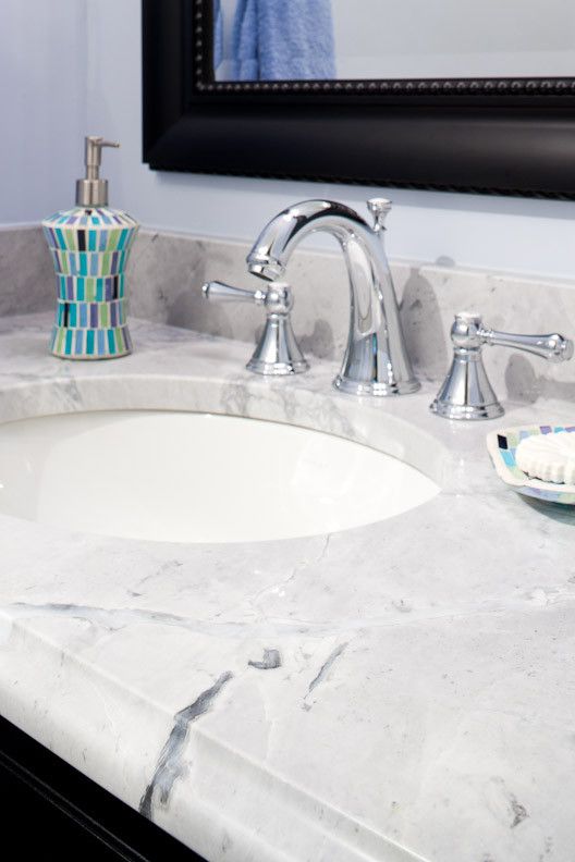 Super White Quartzite for a Modern Bathroom with a Ogee and Super White Quartzite Vanity by Counteredge