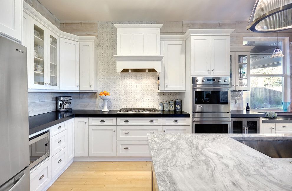 Super White Quartzite for a Traditional Kitchen with a Double Oven and Traditional Kitchen by Narfinecarpentry.com