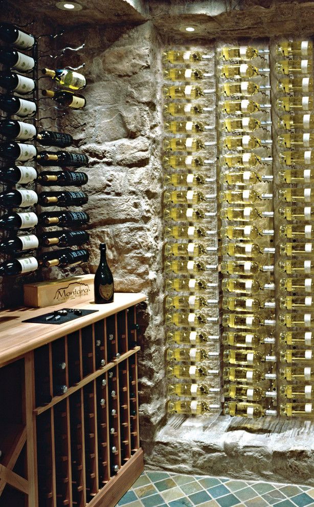 Superior Moulding for a Contemporary Wine Cellar with a Wine Racks and Wine Bottle Storage by Superior Moulding of Nevada