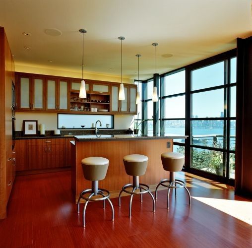 Swenson Granite for a Modern Kitchen with a Stool and Rhodes Architecture + Light by Rhodesarchitecture