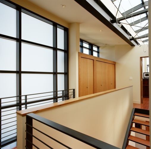 Swenson Granite for a Modern Staircase with a Window and Rhodes Architecture + Light by Rhodesarchitecture