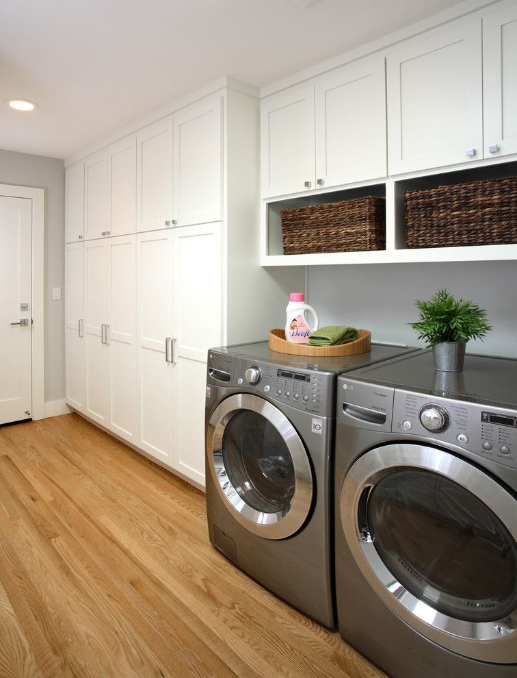 Swiss Coffee Paint for a Traditional Laundry Room with a Cabinets and #55   Millennium Enterprises   Menlo by Precision Cabinets