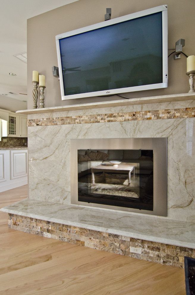 Taj Mahal Granite for a Contemporary Living Room with a Fireplace Insert and Taj Mahal Quartzite Fireplace Surround by Granite Grannies