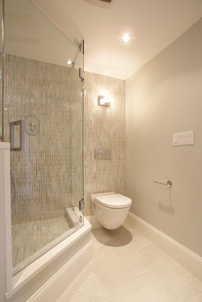 Tankless Water Heater vs Tank for a Contemporary Bathroom with a Sconce and Commercial Wharf Condo, Boston, Ma by Serret Construction and Design