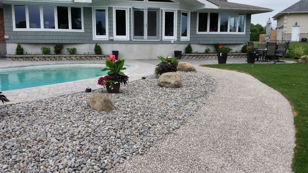 Tar and Chip Driveway for a Rustic Spaces with a Asphalt Alternative and Tar and Chip Ottawa by Tar and Chip Ottawa