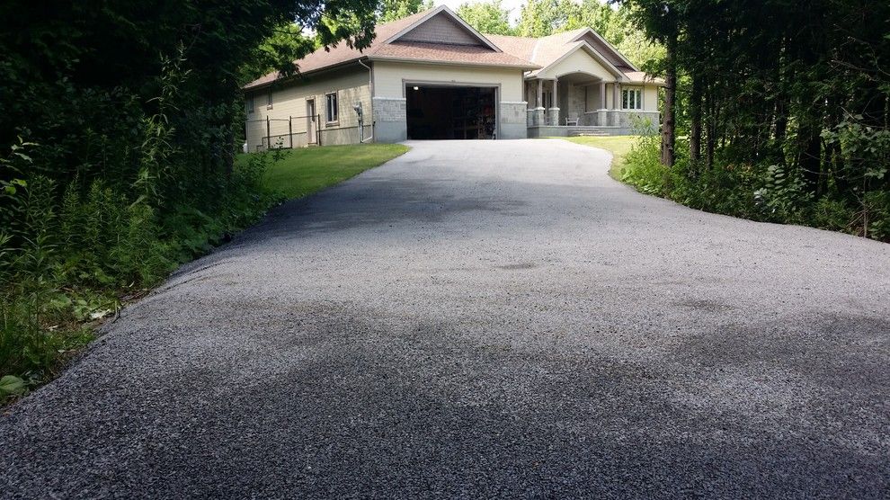 Tar and Chip Driveway for a Rustic Spaces with a Eco Paving and Tar and Chip Ottawa by Tar and Chip Ottawa