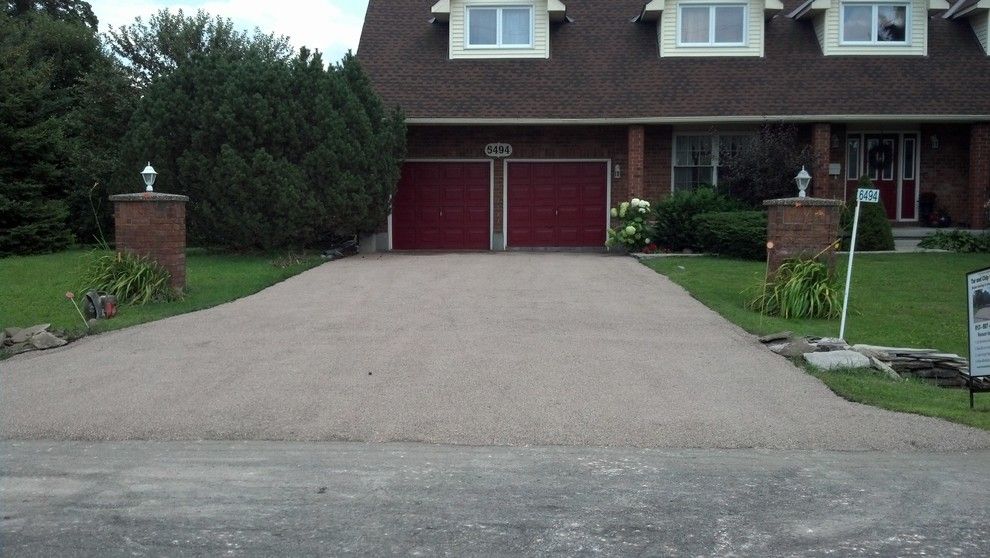 Tar and Chip Driveway for a Rustic Spaces with a Eco Paving and Tar and Chip Ottawa by Tar and Chip Ottawa