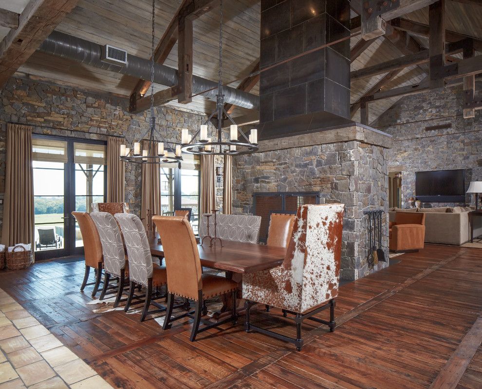 Texas Tool Traders for a Rustic Dining Room with a Cow Hide Upholstery and Ranch by Thompson Custom Homes