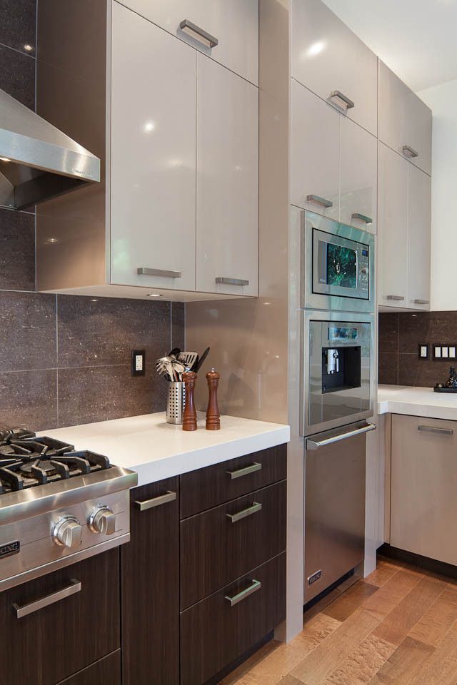 Thermofoil for a Contemporary Kitchen with a Stainless Steel and Benz's Project in West Vancouver by Katerina Vallianatos