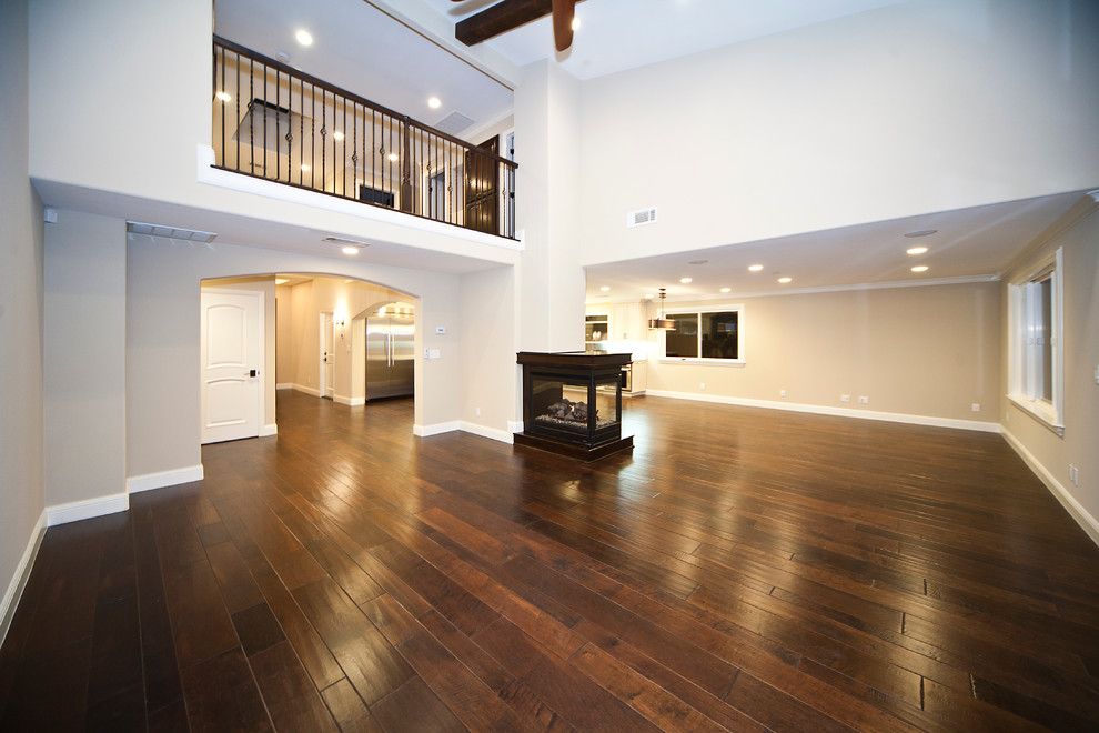 Tiled Fireplaces for a Traditional Living Room with a Maple Engineered Hardwood and Hardwood Flooring by Demar