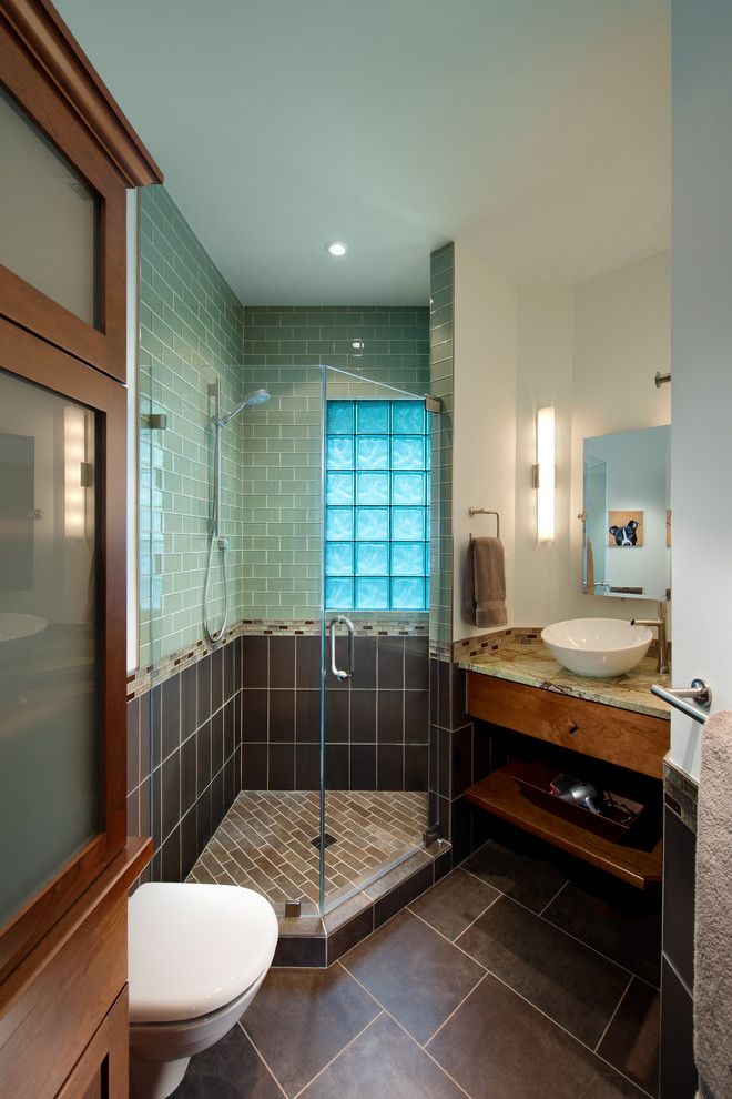 Tiled Shower Ideas for a Craftsman Bathroom with a Blue Tile Shower Wall and Bungalow Update by Fisher Group Llc