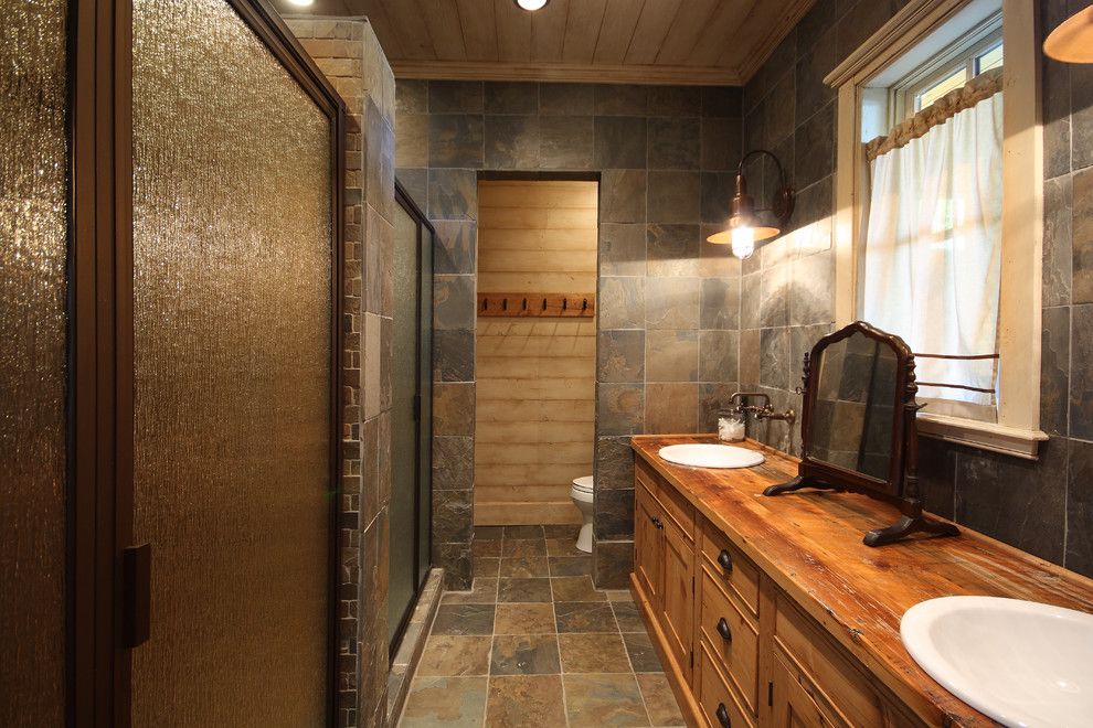 Timberlake Cabinets for a Rustic Bathroom with a Round Sinks and Lake Chatuge Fishing Lodge by Timberlake Custom Homes, Llc