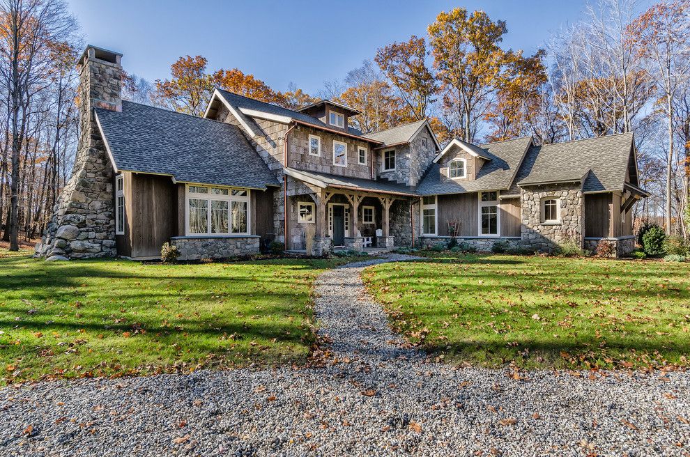 Timberland Homes for a Rustic Exterior with a Log Cabin Lighting and the Beauthaway in Connecticut by Mosscreek