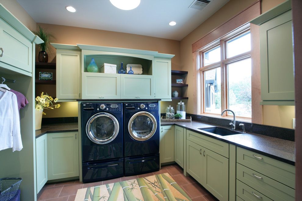 Top Load vs Front Load Washing Machine for a Contemporary Laundry Room with a Floor Tile and Laundry Room by Visbeen Architects