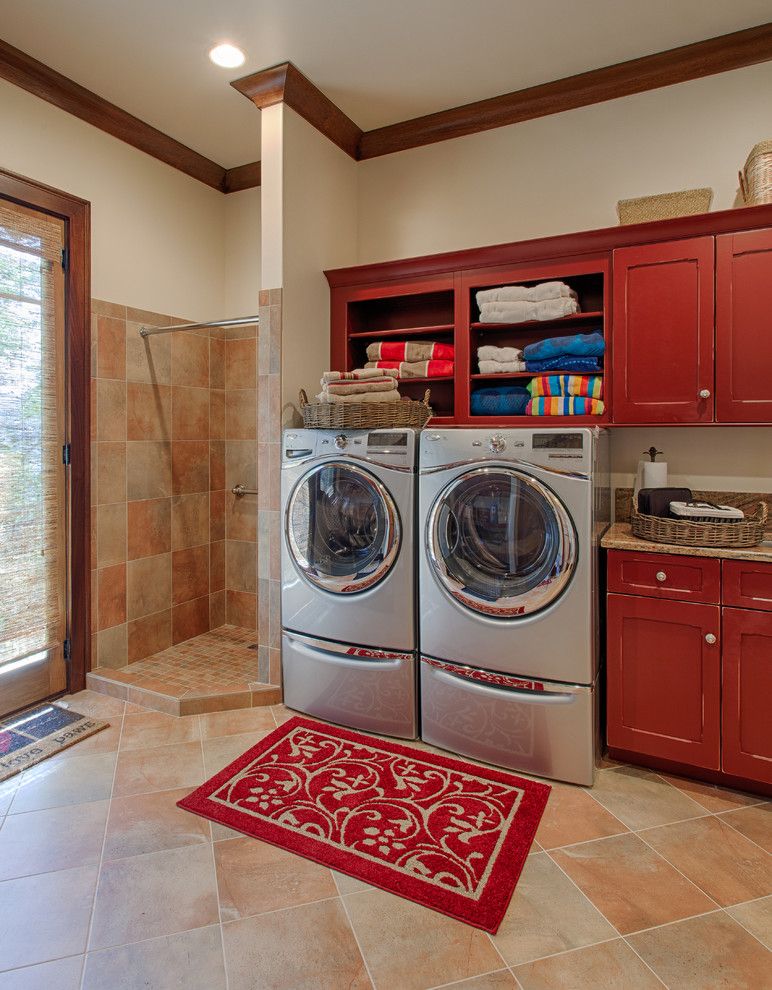 Top Load vs Front Load Washing Machine for a Traditional Laundry Room with a Recessed Lighting and Laundry Room by Advance Cabinetry Mi