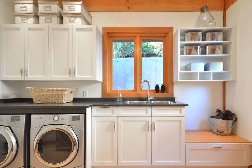 Top Load vs Front Load Washing Machine for a Traditional Laundry Room with a White Drawer and Davis Bay by Streamline Design Ltd.   Kevin Simoes