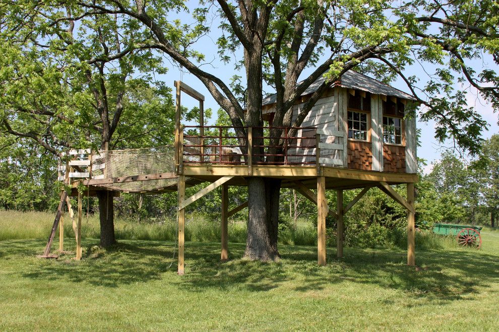 Treehouse Designs for a Eclectic Kids with a Rope Bridge and Unique Projects by Lewis Brothers