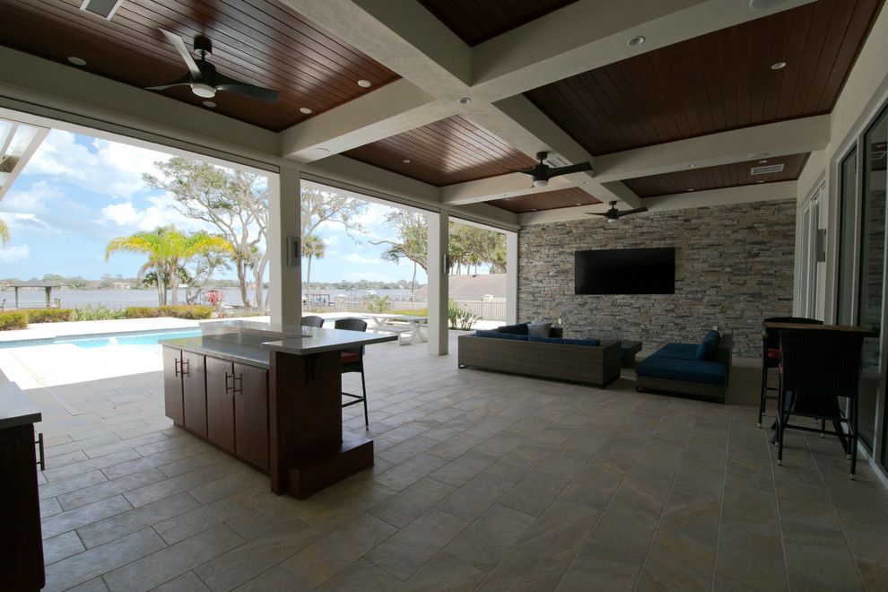 Tremron Pavers for a Contemporary Spaces with a Cypress Tg Ceiling and Contemporary Riverfront Home by Forever Homes