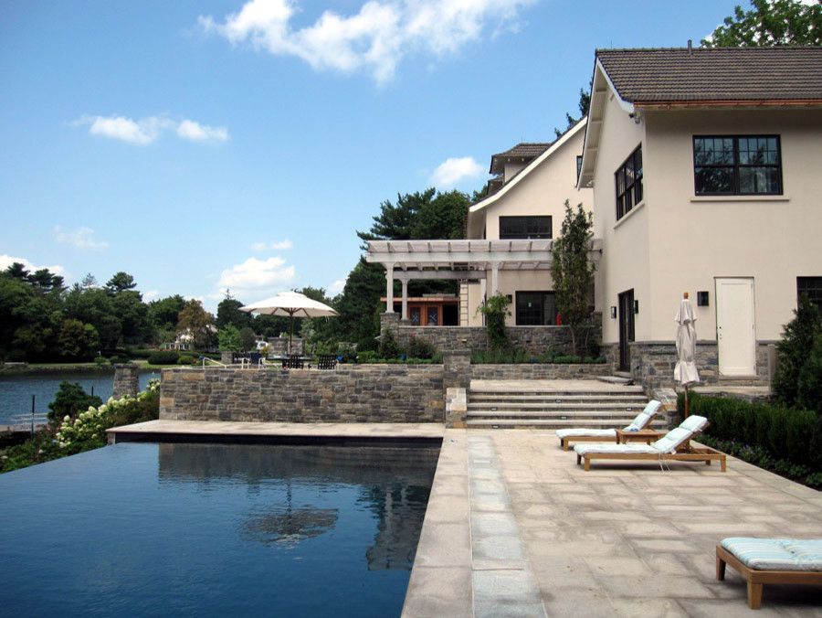 Tremron Pavers for a Transitional Pool with a Modern Site Design and Greenwich Residence by Leap Architecture