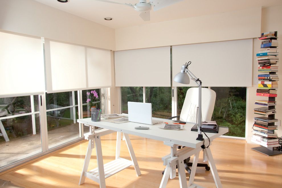 Tropicana Homes for a Modern Home Office with a Ceiling Fan and Somfy by Somfy