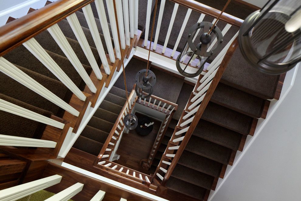 Tuftex Carpet for a Transitional Staircase with a Grand Staircase and Greenwich Residence by Leap Architecture