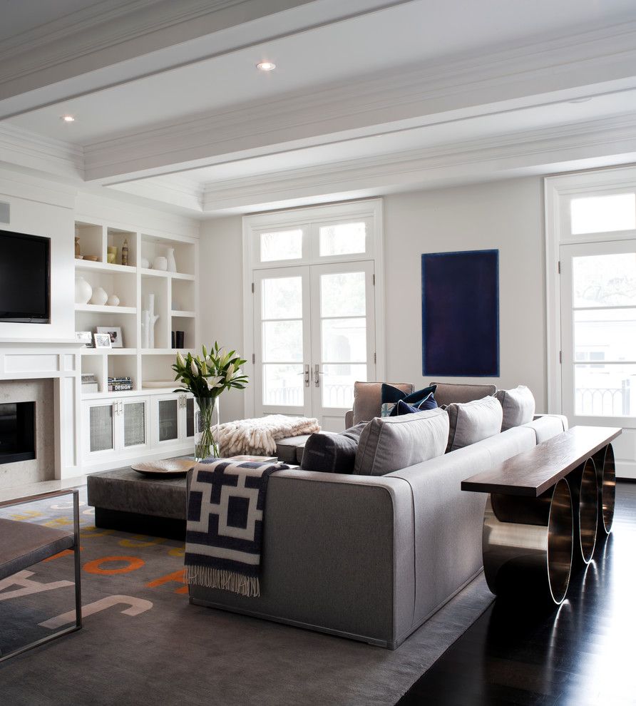 Ubuildit for a Transitional Living Room with a Dark Floor and City Home by Jennifer Worts Design Inc.