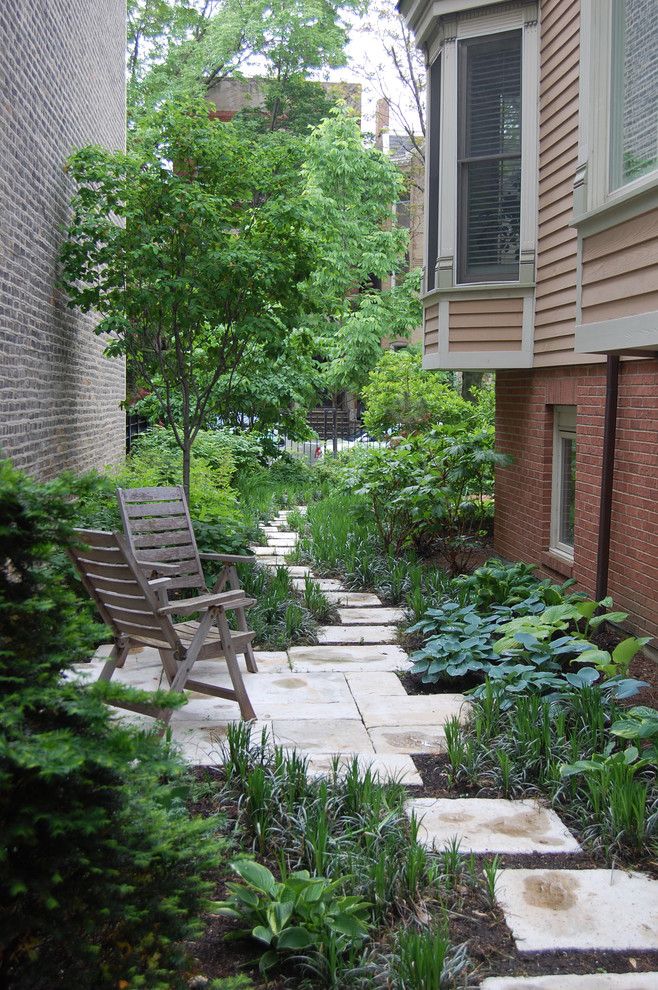 Unilock Pavers for a Traditional Landscape with a Bay Window and Lincoln Park Garden Path by Prassas Landscape Studio Llc
