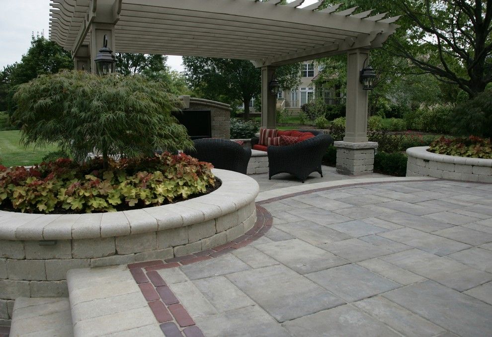 Unilock Pavers for a Traditional Patio with a Brick Paver Patio and Unilock Brick Pavers by Jr's Creative Landscaping