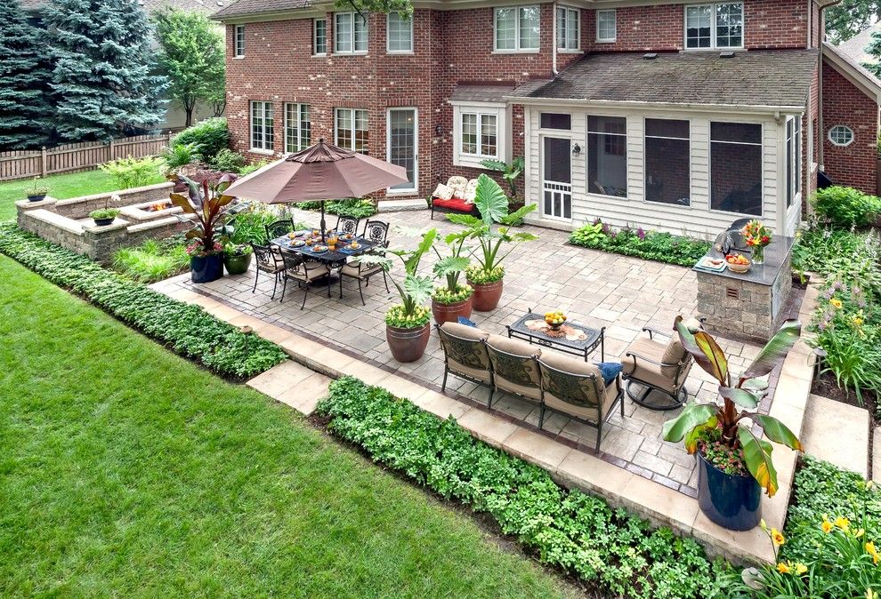 Unilock Pavers for a Traditional Patio with a Screened Porch and Lemont Landscaping by K&d Landscape Management