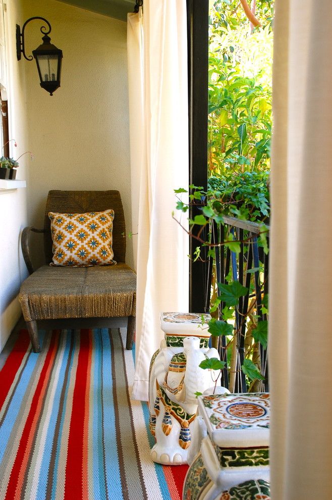 Urban Outfitters Rugs for a Eclectic Porch with a Area Rug and Outdoor Reading Balcony by Lisa Borgnes Giramonti