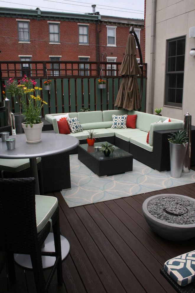 Urban Outfitters Rugs for a Transitional Deck with a Throw Pillows and an Indoor & Outdoor Oasis by Busybee Design