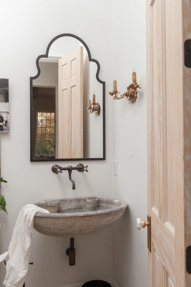 Uttermost for a Mediterranean Powder Room with a Wall Mount Faucets and Vestavia Hills Home by Ruff Reams Building Co.