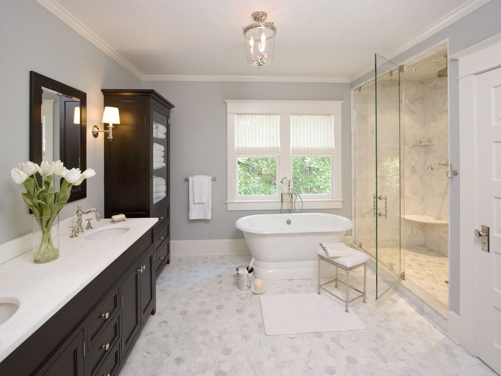 Vaughan Lighting for a Traditional Bathroom with a Towel Storage and Clawson Architects Projects by Clawson Architects, Llc