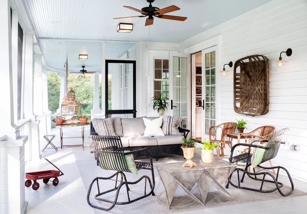 Veranda Magazine for a Farmhouse Porch with a Ceiling Fan and Renewing Old World Charm by Urban Home Magazine
