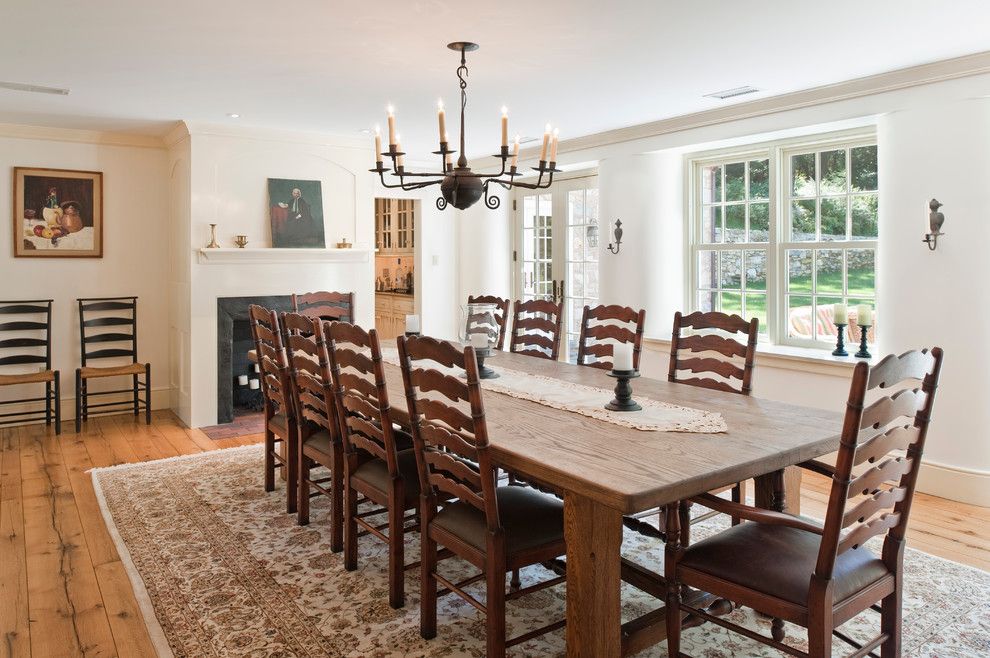 Vermont Farm Table for a Farmhouse Dining Room with a Wood Chairs and Cold Springs Farm by Period Architecture Ltd.