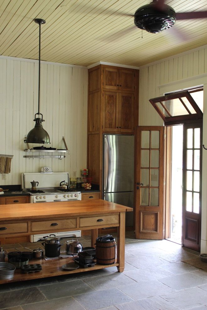 Vermont Soapstone for a Farmhouse Kitchen with a Glass Upper Cabnets and Hudson Valley Farmhouse Kitchen by Jeff Wilkinson, Ra